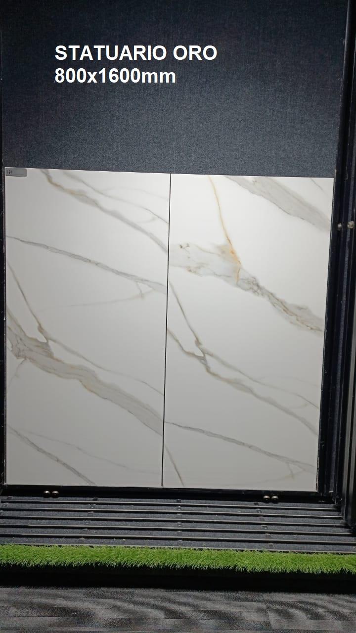 STATUARIO ORO