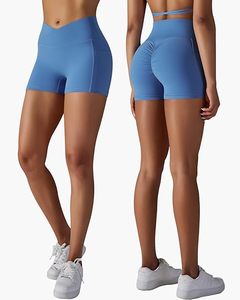 Pantalones cortos de Yoga de calidad superior para mujer, cintura cruzada, gimnasio activo, 100% poliéster, yoga elástico con bolsillos laterales - Product Image 1