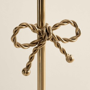 Lámpara de mesa de latón vintage moderna con acento de nudo de lazo y pantalla de tela blanca elegante iluminación de mesita de noche - Product Image 3