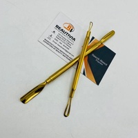 Poussoir de cuticules d'ongle en acier durable de haute qualité dissolvant de cuticules à Double extrémité plaqué or pour le nettoyage des ongles