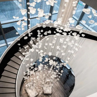 Lustre LED moderne en verre transparent, personnalisable pour les plafonds hauts, les escaliers d'hôtel, l'éclairage intérieur