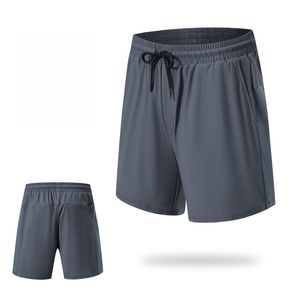 Venta caliente de malla con bolsillos con cremallera de poliéster para hombre corriendo deportes de compresión pantalones cortos atléticos - Product Image 1