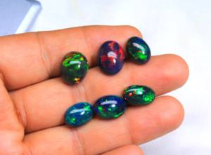 Opale noire éthiopienne naturelle unique en vrac ovale Welo brillant arc-en-ciel Flashy Cabochon prix de gros - Product Image 5