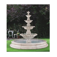 Élégante fontaine de jardin en marbre à plusieurs niveaux avec sculptures artisanales pour l'entrée de la cour Villa Patio Resort et la décoration extérieure