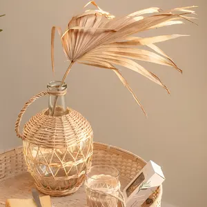Vase à fleurs en verre de rotin de charme rustique créatif avec une couche de rotin tissé pour la pièce maîtresse de mariage Vases en verre clair modernes - Product Image 1