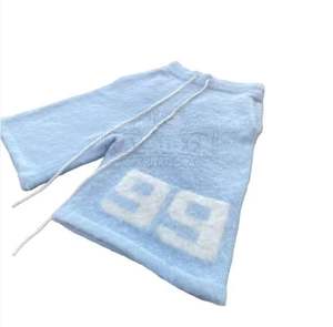 กางเกงขาสั้นสำหรับผู้ชายสีตัดกันทำจากปากีสถาน - Product Image 2