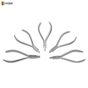Juego de 5 alicates dentales de ortodoncia de acero inoxidable de buena calidad alicates dentales de Ortodoncia con logotipo personalizado - Product Image 1