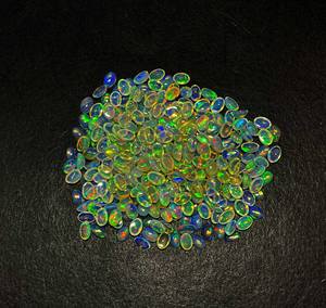 พลอยโอปอลเอทิโอเปียเพลิงสีฟ้าธรรมชาติ33ชิ้น4*6มม. ทรงวงรี10 CT ล็อต IGI อเมทิสต์อัญมณีทรงลูกแพร์อัญมณีหลวม" - Product Image 6