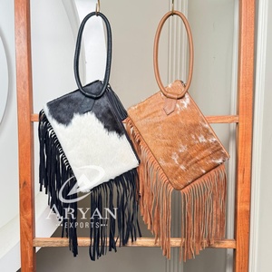 2025 lujo piel de vaca cuero flecos brazalete embrague nuevo diseñador bolso Sling Bag pelo en piel oculta bolso multiuso de mujer - Product Image 1