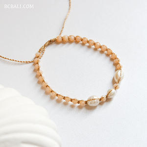 Elegant authentic pearl <b>bracelet</b> adorned sparkling crystal beads and delicate shell <b>charms</b> crafted for high quality <b>fashion</b> - Product Image 2