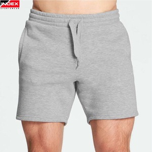 2025 nouveauté hommes Shorts de sport Double poche couleur unie Style décontracté vêtements d'entraînement grande taille plusieurs couleurs maille shorts - Product Image 1
