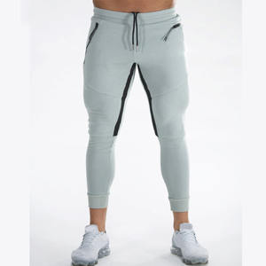 กางเกงวอร์มผ้าโพลีเอสเตอร์สำหรับผู้ชายกางเกงวิ่งผ้าโพลีเอสเตอร์มีแถบด้านข้างและมีโลโก้เฉพาะตัว - Product Image 4