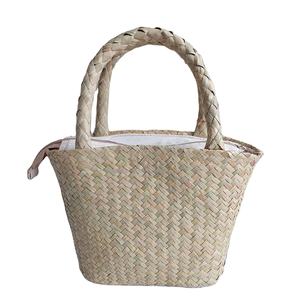 กระเป๋าถือหญ้าทะเลทาสีธรรมชาติ/ กระเป๋าหัตถกรรมทําจากหญ้า เป็นมิตรกับสิ่งแวดล้อมและแฟชั่นจากเวียดนาม - Product Image 1