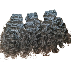 Pelo de trama de máquina de fábrica al por mayor vendedor caliente y pelo humano virginal indio crudo rizado ondulado natural mechones de pelo de trama Genius - Product Image 1
