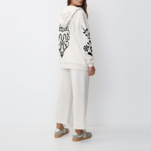 Nueva llegada de ropa de invierno suelta ajuste personalizado bordado parches de color blanco sólido mujeres cremallera sudaderas con capucha moda callejera OEM - Product Image 2