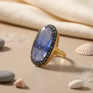 Bague statement pour femme avec topaze bleue taille ovale et diamants taille princesse, plaqué or, bijoux fins, cadeau, fabriqué en platine - Product Image 1
