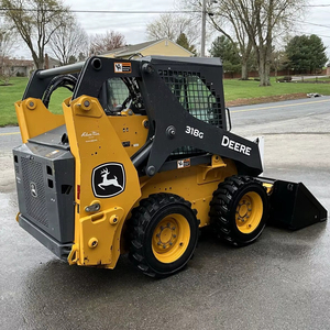 Mini cargadora de dirección deslizante John for Deere 318G con bomba de caja de cambios de cojinete de motor-retroexcavadora de carga frontal usada - Product Image 1