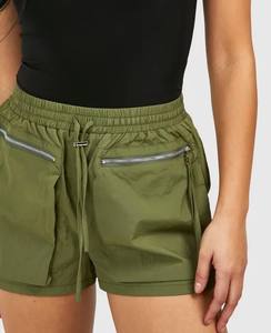 Nouveautés shorts d'été pour femmes sans couture logo personnalisé shorts de yoga d'entraînement pour femmes couleur unie poches avant zippées - Product Image 3