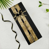 Boîte cadeau rectangulaire longue de luxe noire personnalisée en papier d'art avec revêtement UV, bande en feuille d'or gaufrée et ruban de satin pour la Saint-Valentin et les anniversaires