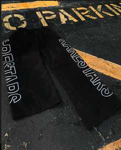 Ropa de calle personalizada de alta calidad, pantalones de chándal acampanados de nailon, pantalones de chándal informales holgados con estampado lateral para hombre, pantalones cortavientos - Product Image 2