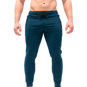 Venta al por mayor de peso pesado de algodón Joggers logotipo personalizado pantalones de chándal holgados pantalones de los hombres ropa de calle y ropa deportiva - Product Image 1