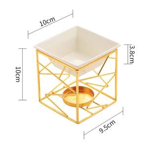 This <b>oil</b> <b>burner</b> a metal warmer with a ceramic bowl is a home decor item and an aromatherapy <b>fragrance</b> diffuser - Product Image 4