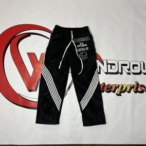 Pantalon coupe-vent baggy pour homme 100% coton Pantalon de survêtement à jambes larges écologique Bandes brodées en nylon et polyester pour sublimation - Product Image 1