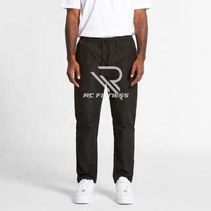 Pantalon de sport décontracté pour homme, séchage rapide, extensible, couleur unie, taille mi-haute, coupe droite ample, respirant, en soie glacée, confortable - Product Image 6