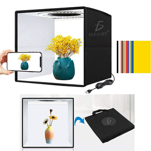 Mini studio photo portable avec kit d'éclairage LED dimmable en PVC et métal pour la photographie de bijoux, incluant des fonds et une lumière vidéo - Product Image 1