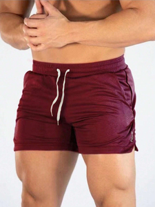 Short de gymnastique pour hommes OEM High Street Short de sport de fitness tissé monocouche de couleur unie à séchage rapide Style décontracté - Product Image 2