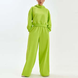 Conjunto de sudadera con capucha y pantalones acampanados con cremallera al por mayor de alta calidad al por mayor, conjunto de chándal de color de bloque con logotipo personalizado de forro polar grueso de algodón - Product Image 1