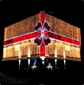 A exposição do Xmas da parede do edifício grande arco conduziu o presente exterior do Natal conduziu o gigante para a decoração comercial do feriado da rua da cidade