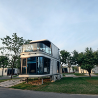 Capsule spatiale préfabriquée double couche personnalisable avec escalier intérieur et verre intimité, idéale pour la construction de stations balnéaires