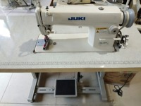 Machine à coudre industrielle à point droit simple aiguille JUKI DDL-8500 d'occasion pour vêtements