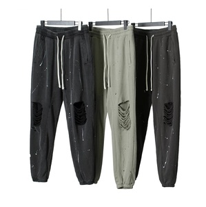 OEM Vente de Gros 2025 Coton 100% Déchiré Pantalon de Survêtement Décontracté Pantalon Coupe Ample Streetwear Pantalon Fitness à Cordon sur Mesure - Product Image 1