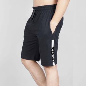 Pantalones cortos de gimnasio para correr estilo de calle para hombre, bolsillos estampados personalizados que absorben la humedad, cintura elástica de algodón - Product Image 1