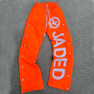 Custom High Street 100% tela de nailon a prueba de viento remache diseño desgastado bordado holgado ajuste pantalones de chándal de pierna recta para hombres - Product Image 3