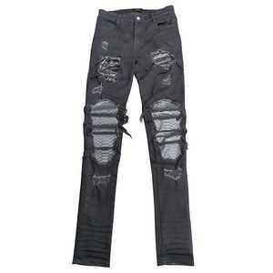 กางเกงยีนส์สตรีทแวร์ผ้ายืดคุณภาพสูงแบบใหม่ สีดำ แต่งลายขาด ปะติดลายหนังงู ทรงสกินนี่ ขาดเซอร์ๆ - Product Image 1