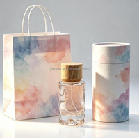 Flacon de parfum en verre 50 ml à motif vague unique, atomiseur cylindrique rechargeable, design fond volcan et capuchon en bois pour commande en gros