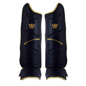 Protège-tibias de Muay Thai en cuir réglable, léger et respirant, avec protection des pieds et des genoux – Prix usine - Product Image 1