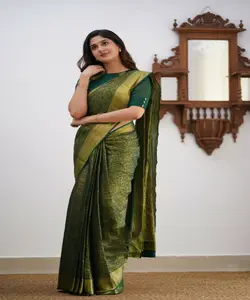 Opulent Rich Look New Arrival Kanchipuram Silk Saree with Traditional Motifs and Stone Work.