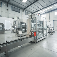 Machine de remplissage automatique de liquides de haute précision pour bouteilles en plastique et en verre, eau, jus, miel, huile, produits chimiques