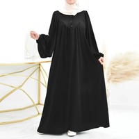 Nouveau musulman printemps et automne mode décontracté bulle à manches longues Simple couleur unie col rond bouton femmes combinaison longue robe