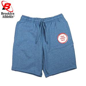 Short d'entraînement de gymnastique à la taille élastique pour homme Short de fitness décontracté à motif solide Méthode de tissage non tissé teint en plaine - Product Image 1