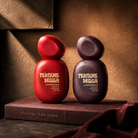 Flacon de parfum en verre de 50 ml en gros, forme galet, style estival coloré, contenant de parfum, chaîne d'approvisionnement prête à l'emploi, vente en gros