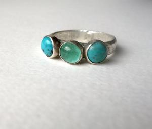 แหวนเงินแท้ 925 ประดับด้วยหินเทอร์ควอยซ์ธรรมชาติเรียบหรู ขนาด 10 มม. พร้อมใบรับรอง IGI - Product Image 4