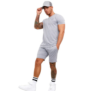 Camiseta de verano de secado rápido para hombre, algodón y poliéster, transpirable, patrón sólido, estilo callejero, conjunto corto para deportes de clima cálido - Product Image 1