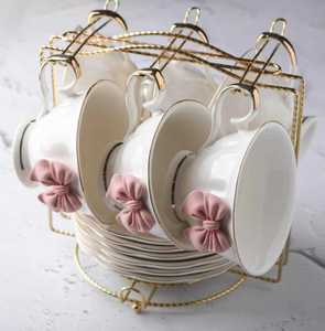 Taza de Té de Porcelana Romántica con Lazo Rosa, Colección Reliquia: Juego de Té con Lazo Rosa y Ribete Dorado - Product Image 1