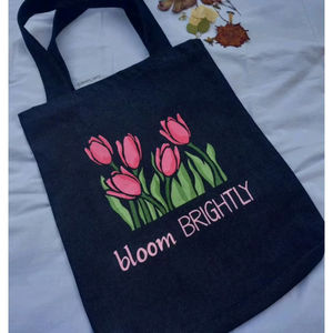 Bloom Brightly Tulip Tote Bag With Tulip Flower And Quote Print On Cotton Canvas In <b>Black</b> Designed For Everyday Carry Use - Product Image 1