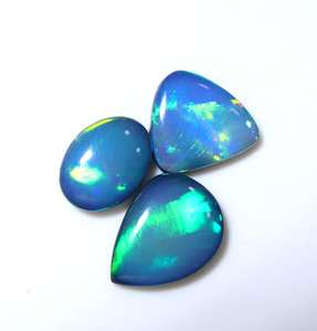 โอปอลเอธิโอเปียไฟสีฟ้าคู่พลอยโอปอลเอธิโอเปียทรงหลังเบี้ยเรียบขนาด12X9MM เพื่อ15X11MM คุณภาพสูงสุด - Product Image 4